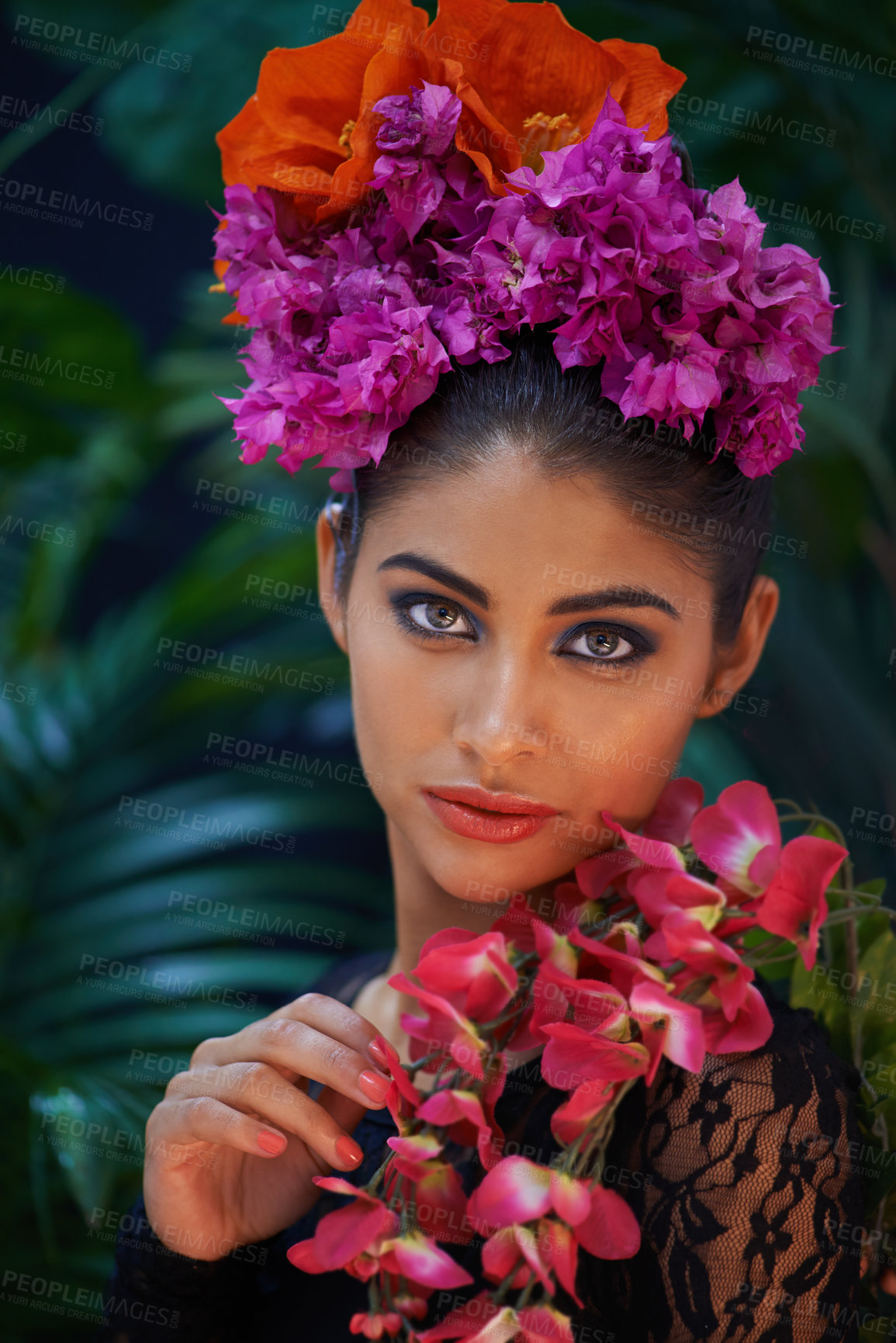 Buy stock photo A portrait of a beautiful woman wearing colorful flowers