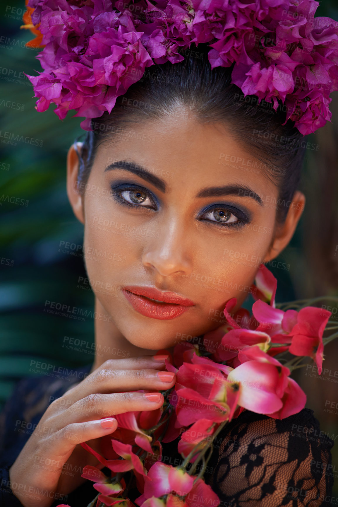 Buy stock photo Jungle, portrait or Indian woman with flowers for beauty, natural cosmetics or wellness in nature aesthetic. Color, person or face of model with at eco friendly skincare, plants or spring floral art