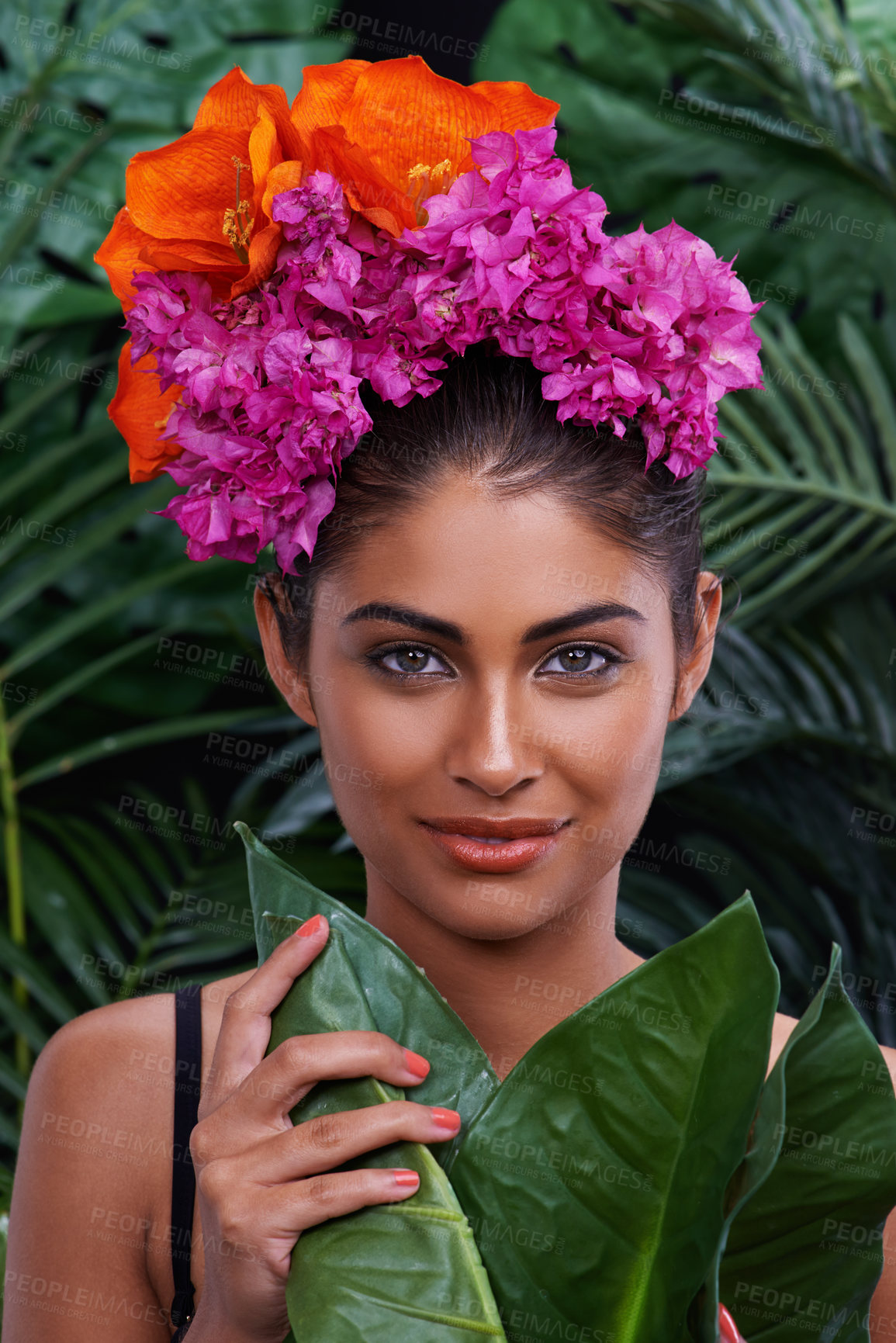 Buy stock photo Beautiful young woman wearing flowers outdoors