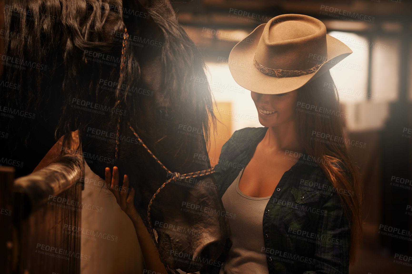 Buy stock photo Cowgirl, smile and woman with horse at barn or stable in Texas for recreation. Western, happy person and animal at ranch with pet or stallion for hobby with livestock for sports training at farm