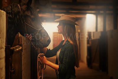 Buy stock photo Cowgirl, happy and woman with horse at barn or stable in Texas for recreation. Western, animal and smile of person at ranch with pet or stallion for hobby with care for livestock at equestrian farm