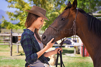 Buy stock photo Cowgirl, happy and woman with horse at farm outdoor in summer or nature in Texas for recreation. Western, smile and female person with animal at ranch, pet or stallion in the countryside together