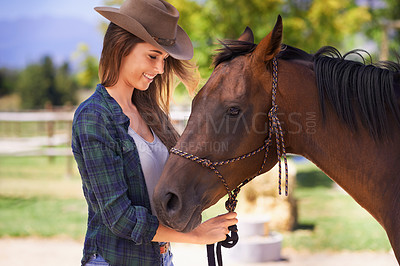 Buy stock photo Cowgirl, smile and woman with horse at farm outdoor in summer or nature in Texas for recreation. Western, happy female person and animal at ranch, pet or stallion in the rural countryside together