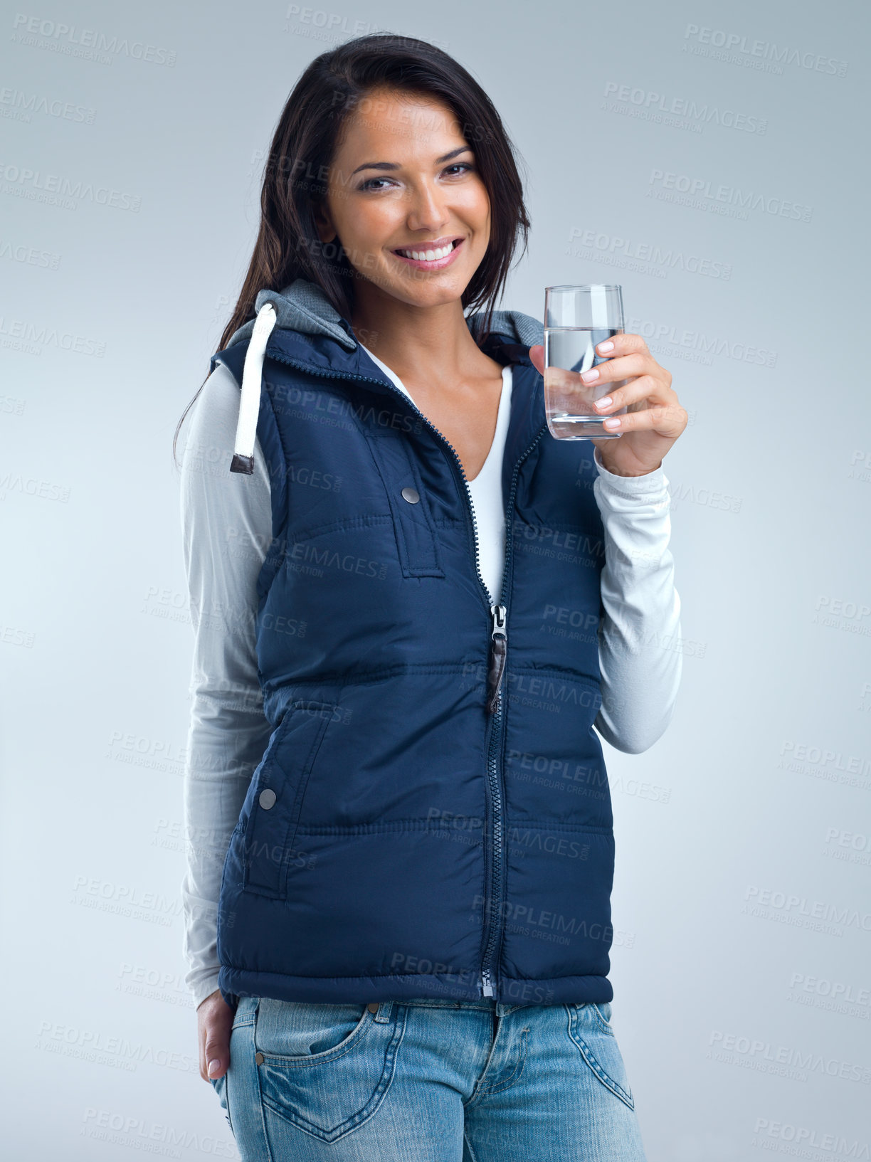 Buy stock photo Woman in portrait, water for health and hydration in studio, nutrition and wellness with drink for thirst on grey background. Liquid, aqua and h2o in glass, fresh and clean for refreshment and detox