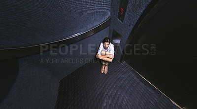Buy stock photo Distorted shot of a young woman trapped in an elevator