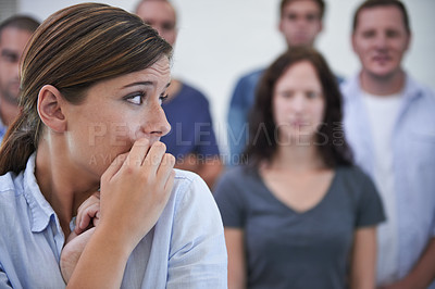 Buy stock photo Business, bullying or woman with biting nails anxiety in office with harassment, conflict or stare. Judgment, stress or lady worker with new job criticism, shame or corporate gossip, rumor or victim