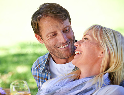 Buy stock photo Couple, embrace and relax in park with wine glass for bonding connection on holiday, celebration or summer. Man, woman and drinking in nature with or happiness date as marriage, honeymoon or love