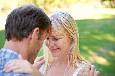 Buy stock photo Love, smile and couple hug in a park with trust, care and support, security or solidarity outdoor. Smile, romance and people embrace in forest with fresh air, commitment or peaceful vacation trip