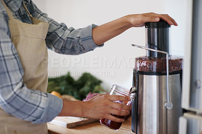 Buy stock photo Person, hands and kitchen with juicer, blender or mixer for fruit, smoothie or nutrition at home. Closeup of nutritionist mixing ingredients, vitamins or vegetables in food processor or jar for drink