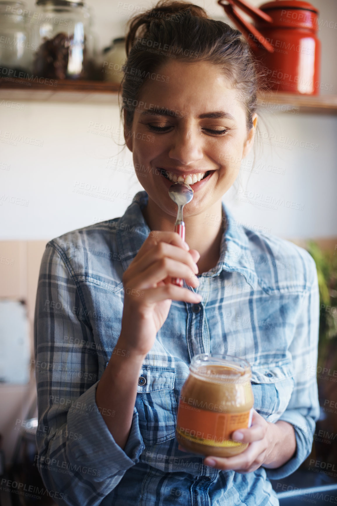 Buy stock photo Woman, jar and peanut butter with kitchen, smile and person for food for health and wellness. Nutritionist, spread and protein for nutrition, vitamins or vitality for diet at home or house with spoon