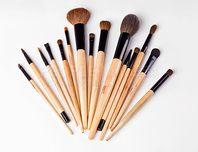 Buy stock photo An isolated shot of s set of makeup brushes