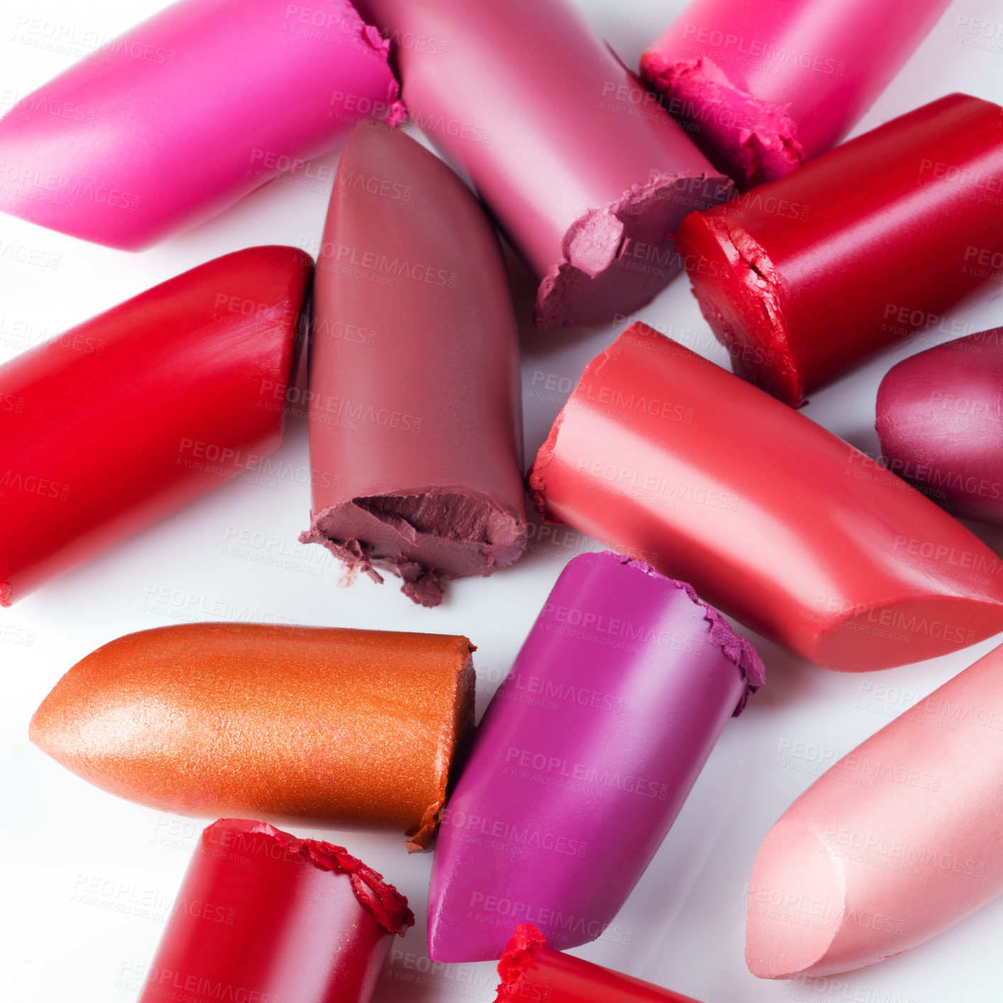 Buy stock photo Shot of lipsticks lying loosely against a white backdrop 
