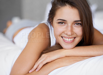Buy stock photo Morning, relax and portrait of girl in bed with wellness, confidence and happy weekend in apartment. Face, smile and woman on bedroom pillow for healthy sleep, wake up comfort or natural rest in home
