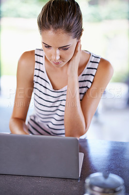 Buy stock photo Reading, blog and woman in home with laptop for research and recipe for dinner. Online, thinking and person scroll on computer and learning from internet about information and streaming in kitchen