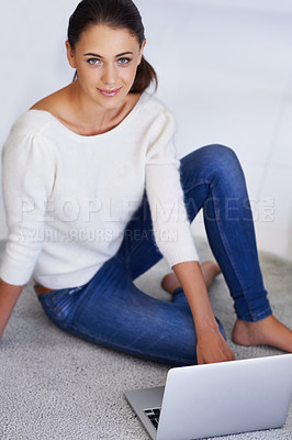 Buy stock photo Laptop, floor and portrait of happy woman in home for remote work, social media or reading email on internet in Argentina. Computer, freelancer and person on carpet with technology to relax in house