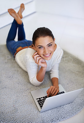 Buy stock photo Laptop, smile and portrait of woman on floor in home for remote work, social media or email on internet in Australia. Computer, freelancer and happy face of person on carpet with technology to relax