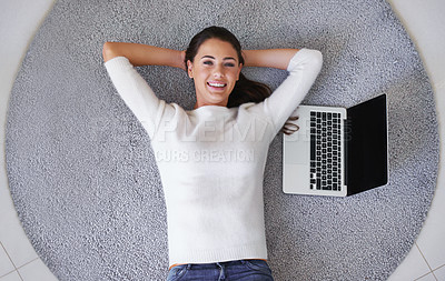 Buy stock photo Happy woman, portrait and relax with laptop on floor above for break, rest or research at home. Top view of female person or freelancer with smile, computer or carpet rug with mockup screen at house
