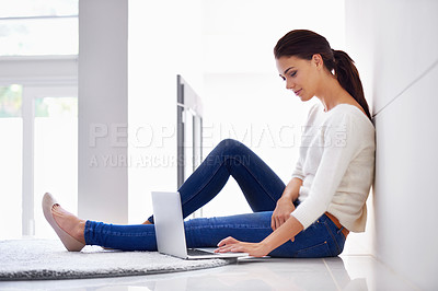 Buy stock photo Laptop, floor and woman in home for remote work, social media or reading email on internet. Computer, freelancer and person on carpet with technology for network, streaming or relax with online blog