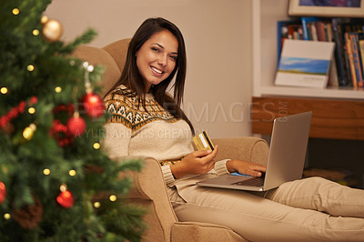 Buy stock photo Portrait of an attractive young woman doing her Christmas shopping online