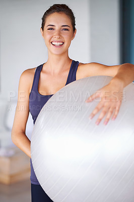 Buy stock photo Portrait, fitness and pilates ball with sport woman at gym for health, wellness or workout. Exercise, training equipment and happy young person satisfied with performance, progress or wellbeing