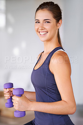 Buy stock photo Portrait, fitness and dumbbells with sporty woman at gym for health, wellness or workout. Exercise, weights for training and happy young person satisfied with performance, progress or wellbeing