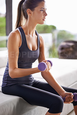 Buy stock photo Woman, fitness and dumbbells at gym for wellness, physical training and health. Exercise, sitting and weights with young female person for performance workout, muscle gain and strength challenge