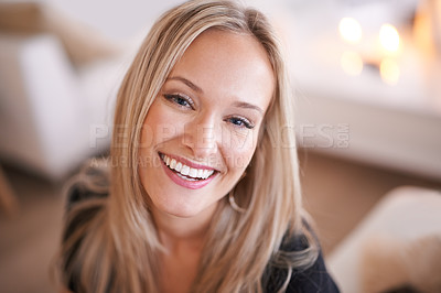Buy stock photo Woman, smile and portrait for relax and happy in home or indoor on weekend and alone on break and joyful. Young person and attractive for peace, rest or chill in living room or house on sofa