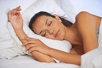 Buy stock photo Peaceful, tired and sleeping woman in home, weekend rest for energy in bed. Morning, dreaming and relax in apartment for exhausted female person, comfort and fatigue with nap for mental health