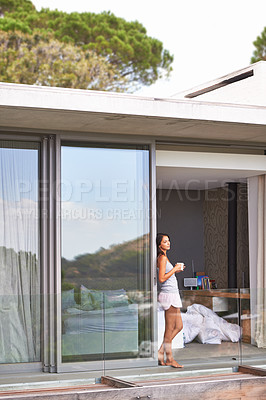 Buy stock photo Woman, balcony and bedroom with coffee on pajamas in morning, fresh and healthy at home in Los Angeles. Glass door, female person and happy with thoughts to relax for  leisure, comfort and enjoy.