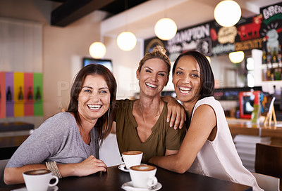 Buy stock photo Portrait, friends or women in coffee shop to drink for a fun reunion, support or holiday with smile, hug or love. Relax, happy or people with a cup of tea for bonding at a restaurant, diner or cafe