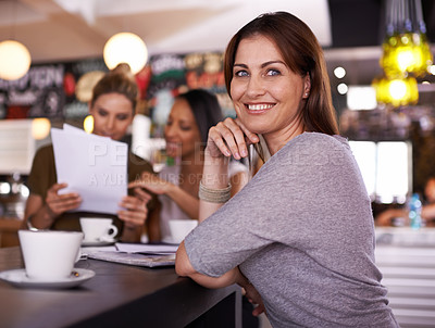 Buy stock photo Business woman, portrait and meeting in coffee shop with smile, pride or confidence with team at lunch. Person, employee and happy at cafe for consultation, negotiation and morning with startup staff