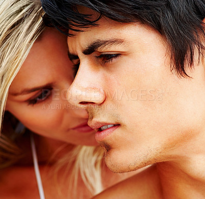 Buy stock photo Closeup of young woman hugging her boyfriend