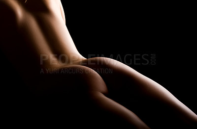 Buy stock photo Nude back and body on young female in soft light