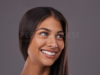 Buy stock photo Thinking, hair and face of happy woman on gray background for healthy texture, wellness and beauty. Smile, hairdresser and person with long hairstyle for salon products, cosmetics and shine in studio