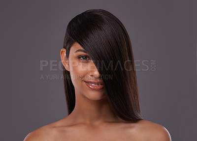 Buy stock photo Portrait, hair care and beauty of happy woman in makeup for skincare isolated on a gray studio background. Hairstyle, face and Indian model in cosmetics at salon for treatment or glow at hairdresser