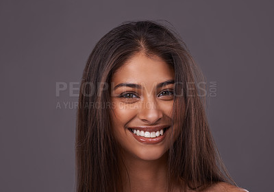 Buy stock photo Portrait, hair or beauty of happy woman, glow or shine in makeup isolated on gray studio background. Face, hairstyle or Indian model in cosmetics at salon for skincare treatment, hairdresser or care