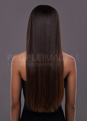 Buy stock photo Rear view of a young woman with beautiful long hair