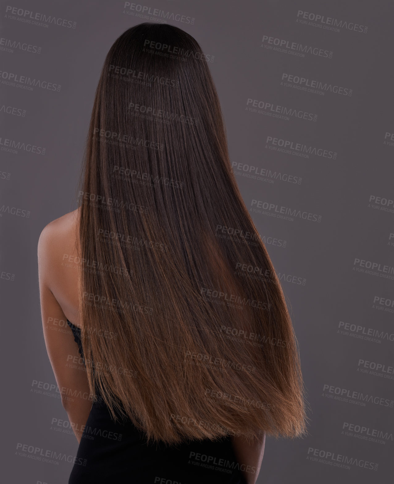 Buy stock photo Hair care, wind and body of woman with beauty, shine or back isolated on a gray studio background. Hairstyle, cosmetics and rear view of model in salon for treatment, growth or hairdresser for glow 