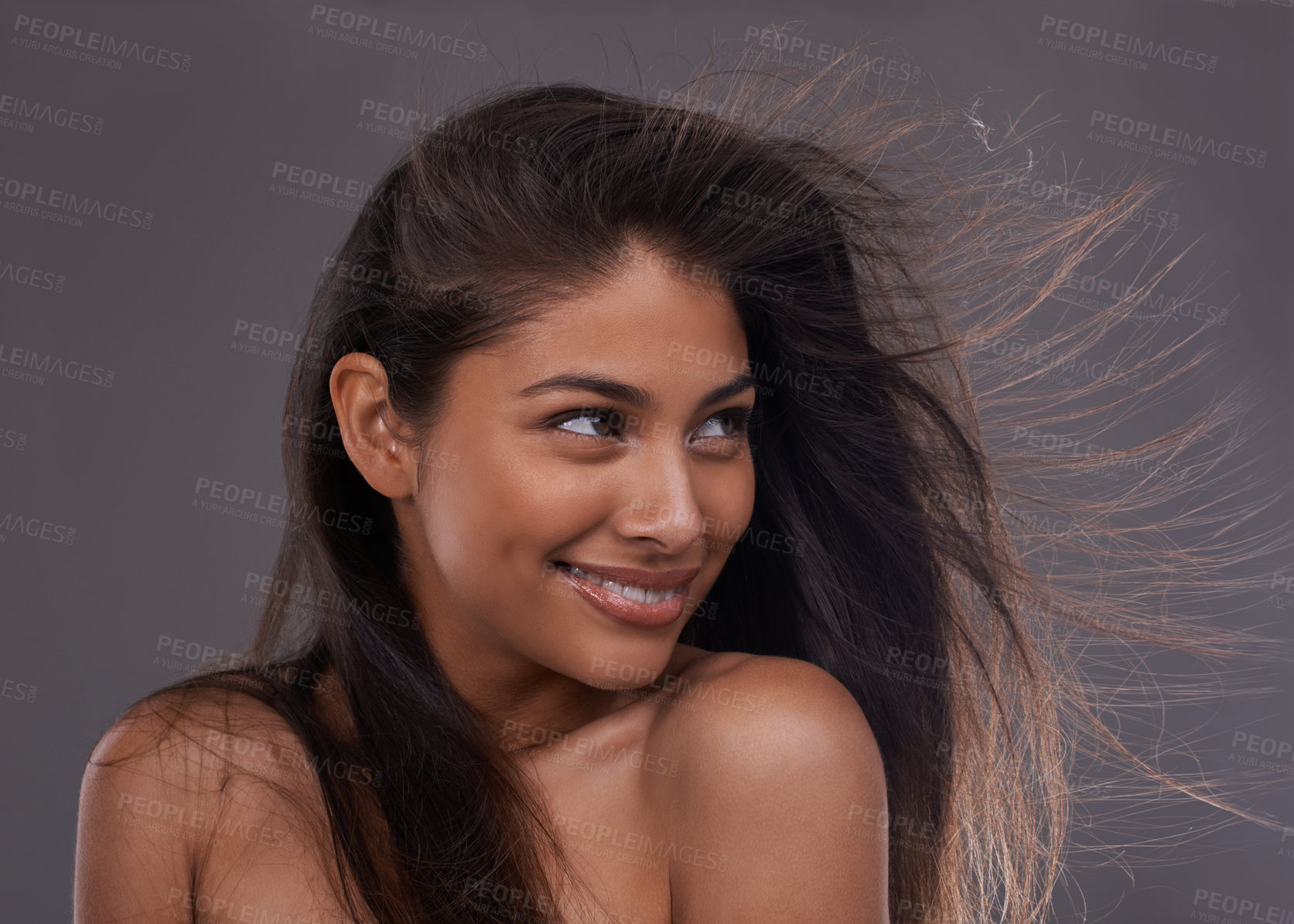 Buy stock photo Woman, hair or thinking of haircare, beauty or idea of health, growth and salon aesthetic in studio. Happy, girl or planning of volume, texture or shine as hairstyle vision on grey background