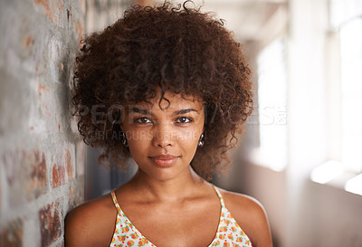 Buy stock photo Portrait of an attractive young woman smiling at the camera