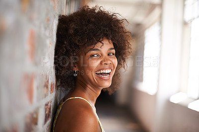 Buy stock photo Portrait, smile and woman by brick wall at college for education, learning or funny laugh in corridor alone. Face,  student and happy girl in hallway of university for profile picture in South Africa