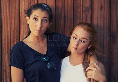 Buy stock photo Portrait, funny face and best friends on wooden background together for bonding or relationship. Love, goofy or silly and happy young women having fun with fashion in summer for holiday and vacation
