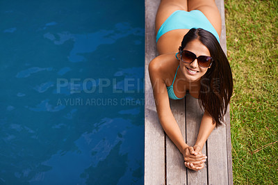 Buy stock photo Portrait of woman, bikini or tanning at swimming pool to relax or chill in summer holiday vacation in Hawaii. Smile, break or happy person sunbathing in swimwear at resort, home or hotel for peace