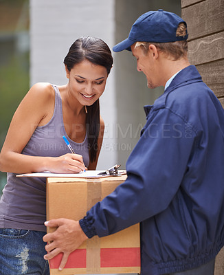Buy stock photo Smile, young woman and signing delivery from postman or exchange for logistics or keeping his client happy. Freight, box and lady at her front door for a package from a courier or shipping company