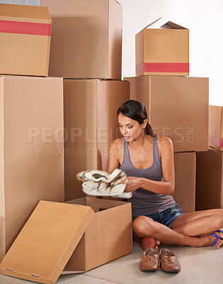 Buy stock photo Boxes, young woman and unpacking for new house or package delivery for logistics and client unwrapping for move. Freight, box and lady sitting with shipment or cargo from a courier or home shipping