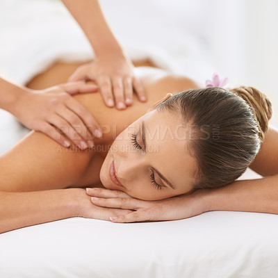 Buy stock photo Cropped shot of a gorgeous young woman enjoying a massage