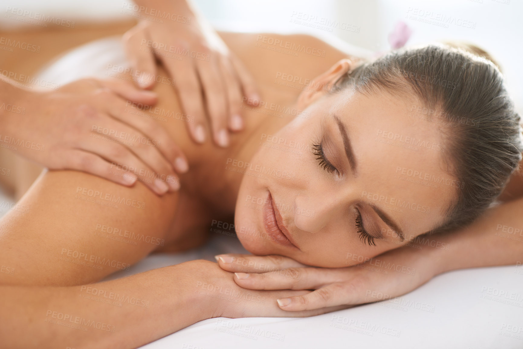 Buy stock photo Relax, shoulder massage and woman at spa for health, wellness and balance with luxury holistic treatment. Self care, peace and girl on table for muscle therapy, comfort and calm body pamper service