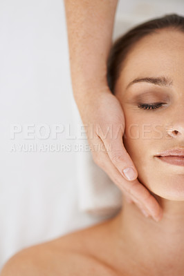 Buy stock photo Woman, hand and massage treatment for face wellness at holiday resort for spa vacation, relaxing or skincare. Female person, masseuse and fingers in Hawaii for dermatology cosmetics, beauty or above