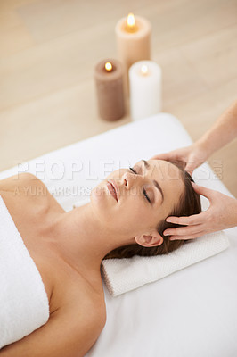 Buy stock photo Relax, head massage and woman at spa for health, wellness and zen with luxury holistic treatment. Self care, peace and girl on bed for aromatherapy, comfort and calm pamper service at hotel salon