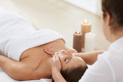 Buy stock photo Woman, massage and physical therapy or relax spa treatment at holiday resort or luxury care, service or stress relief. Female person, masseuse and candles for calm vacation, comfortable or skincare